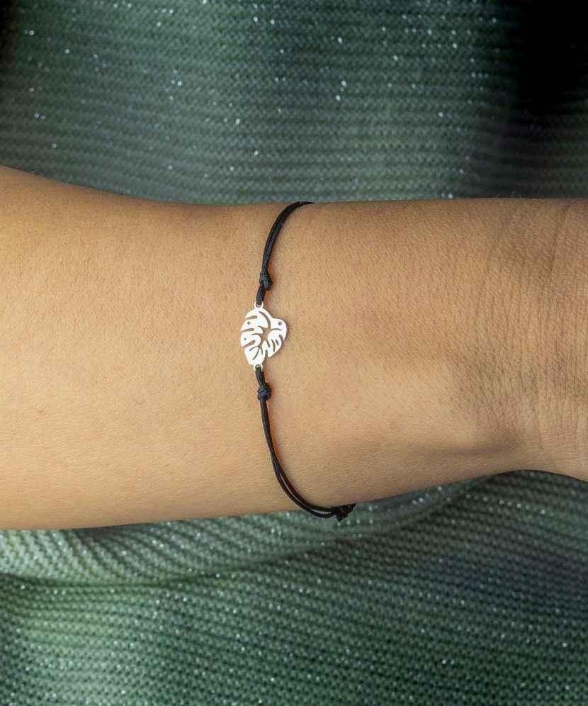 Black string bracelet with a silver pendant "leaf"