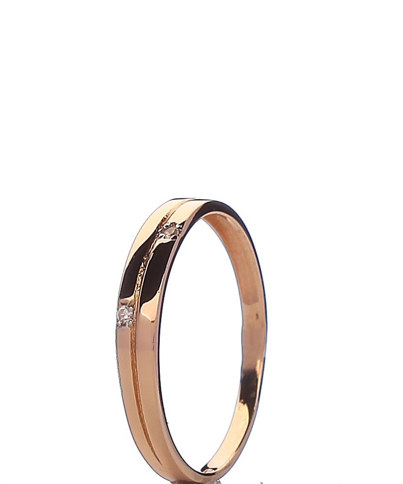 Gold ring with zircons