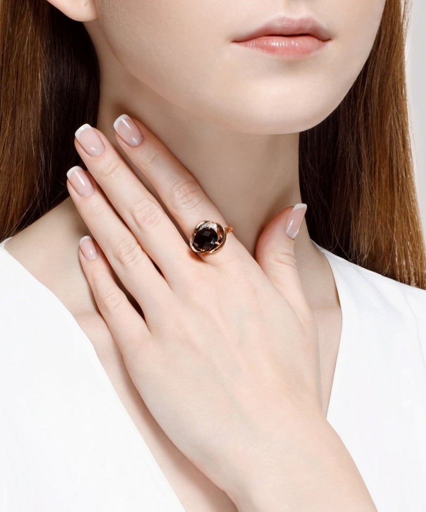 Gold ring with smoky topaz and zircons
