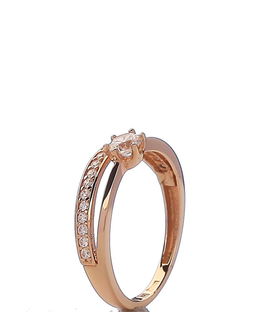 Gold ring with zircons