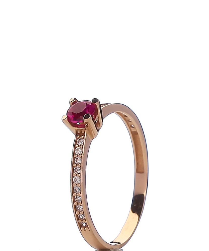 Gold ring with zircons