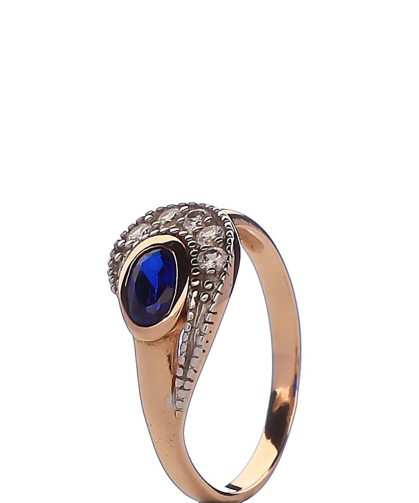 Gold ring with zircons