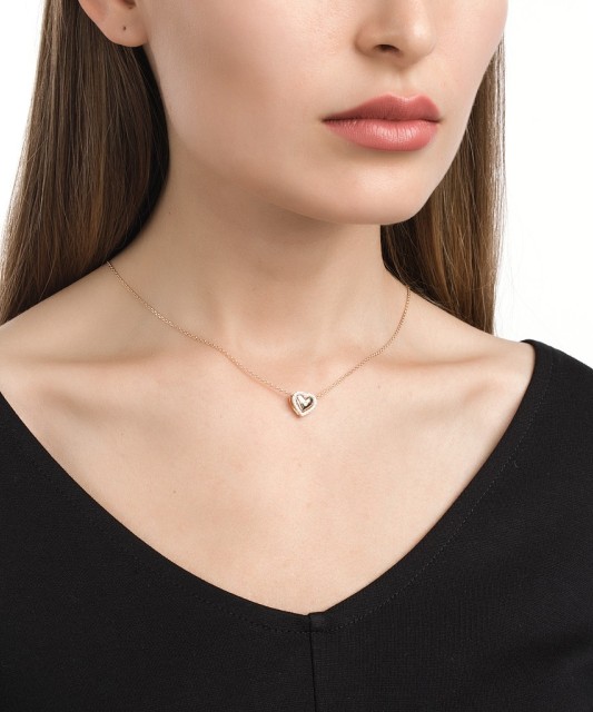 Two-part Gold pendant with zircons "heart"