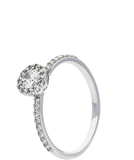 White gold ring with zircons