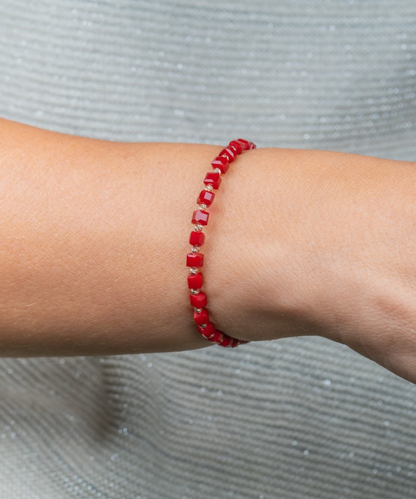 Red string bracelet with gold