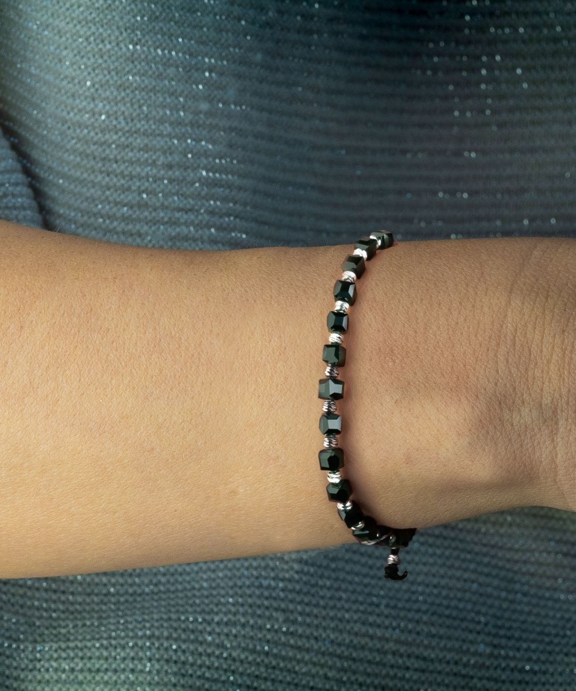 Black string bracelet with silver and onyxes