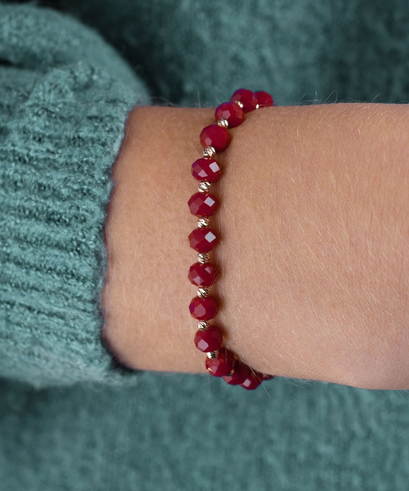 Red string bracelet with gold and onixes