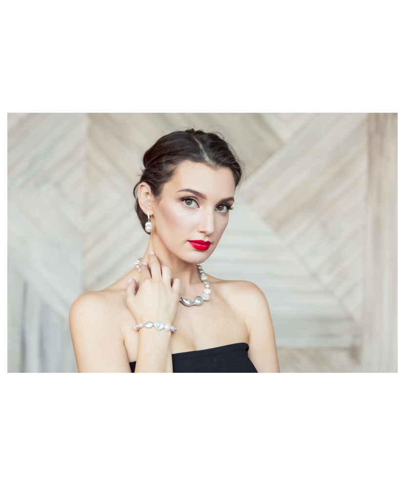 Sterling silver earrings with natural pearl and zircons Sterling silver earrings with natural pearl and zircons