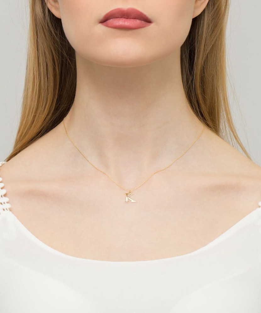 Золотой кулон с бриллиантом, буква K Золотой кулон с бриллиантом, буква K