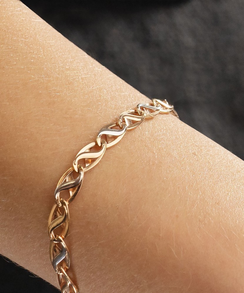 Gold pendant with zirconium "hummingbird"