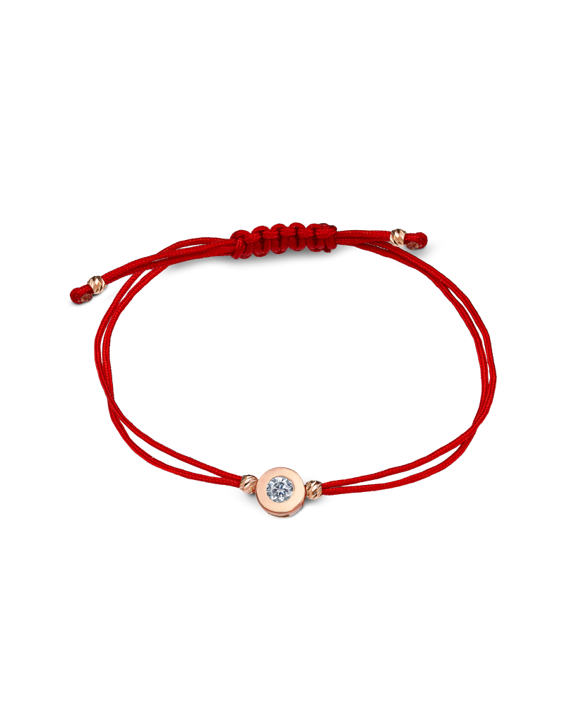 Red string bracelet with gold zirconia pendant