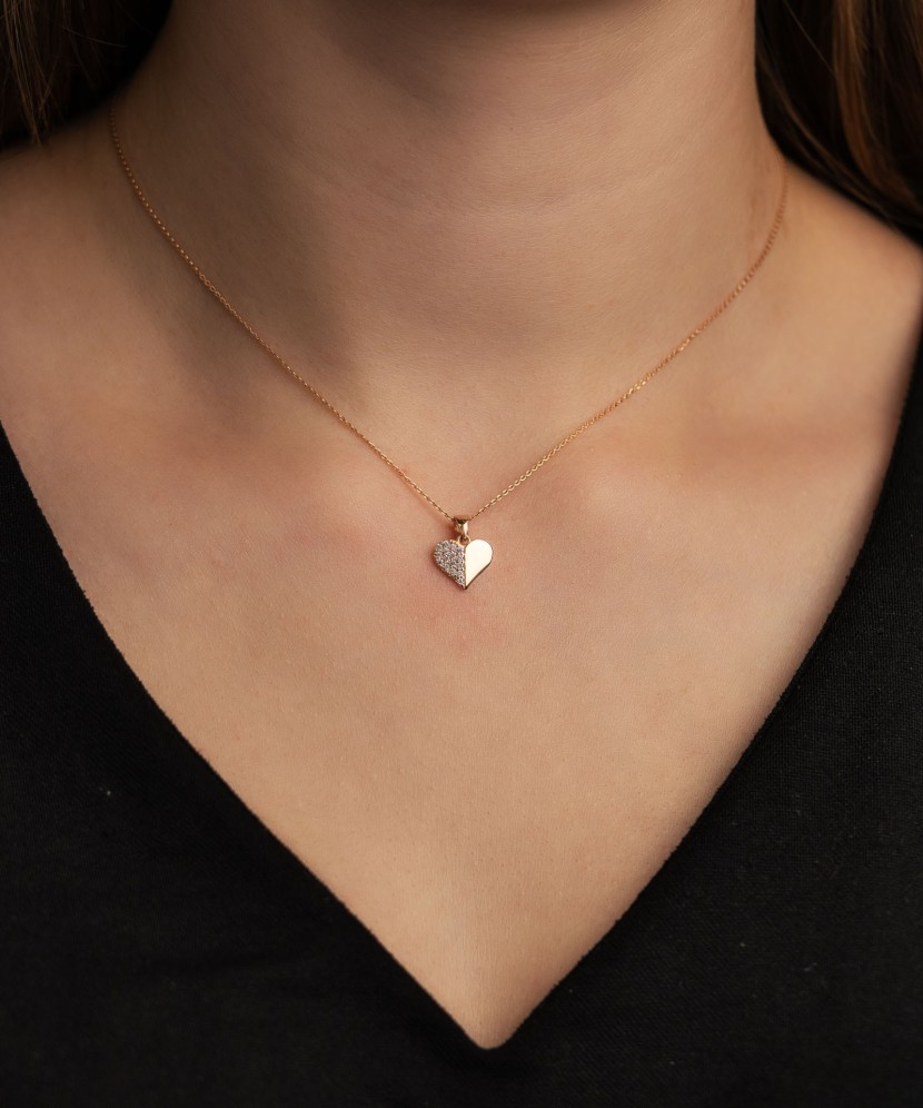 Gold pendant with zircons "heart" Gold pendant with zircons "heart"