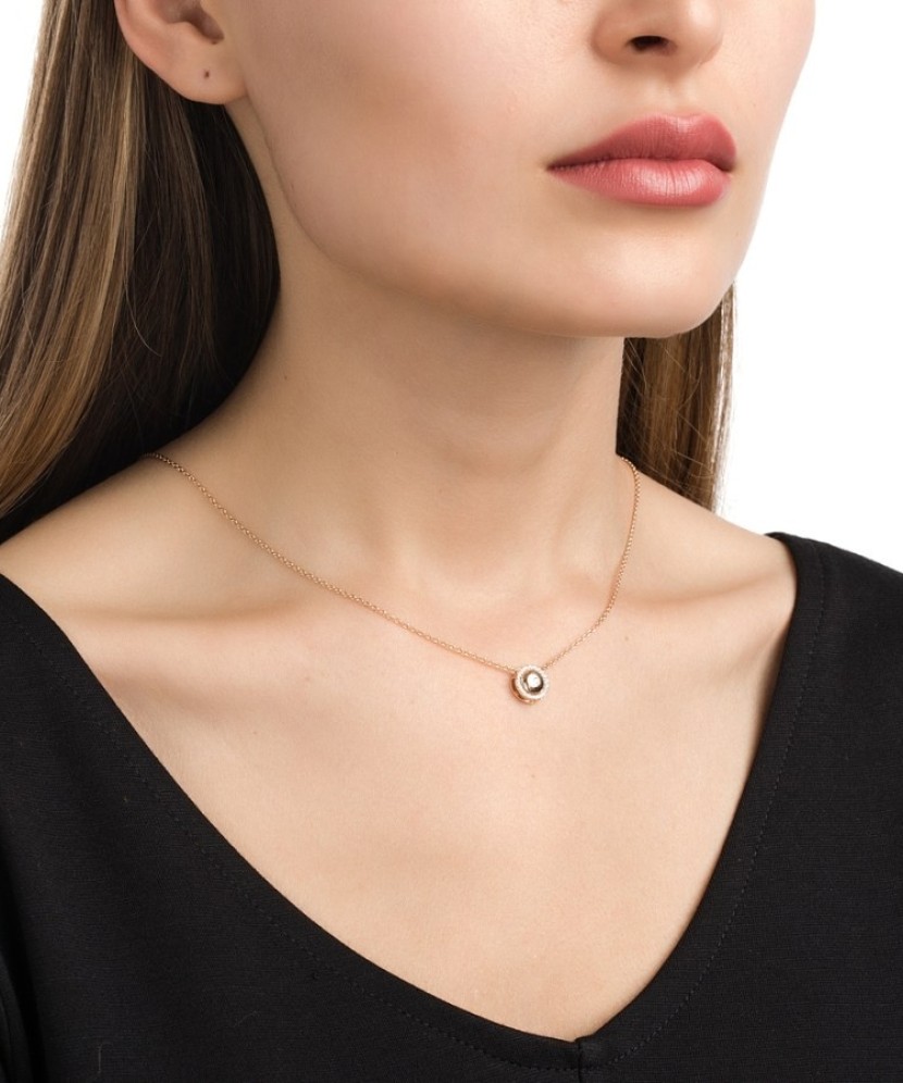 Doubles Gold pendant with zircons