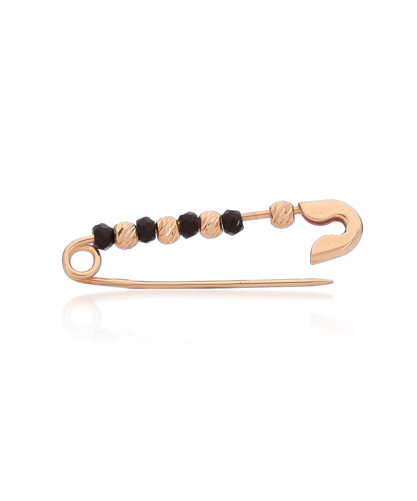 Gold brooch with onyx