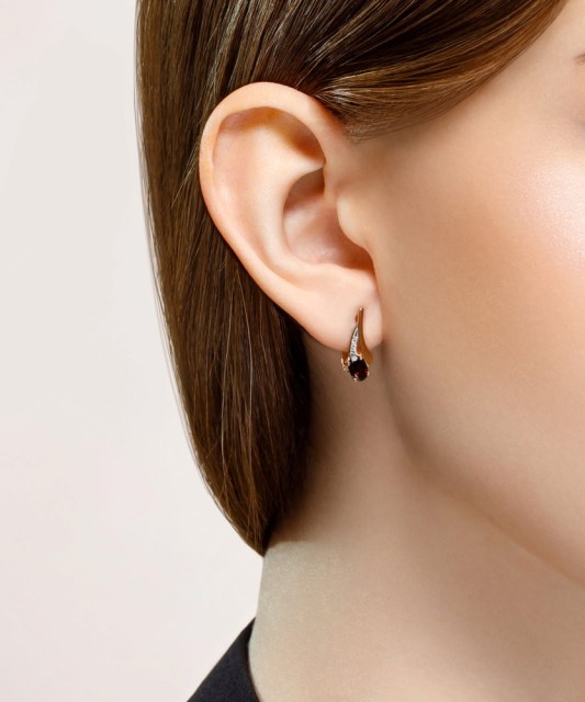 Gold earrings with garnets and zircons
