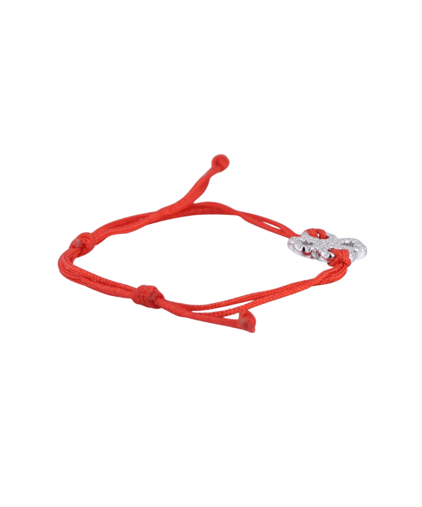 Red string bracelet with a silver pendant and zirconium "Dobilas"