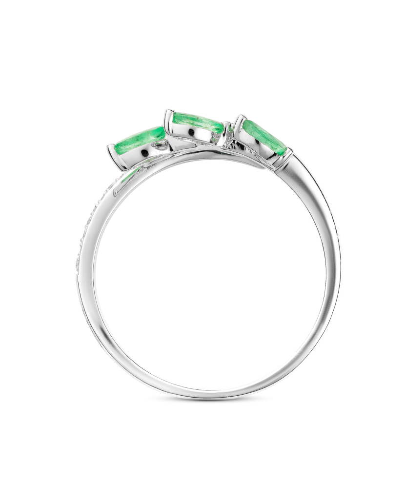 White gold ring with diamonds and emeralds