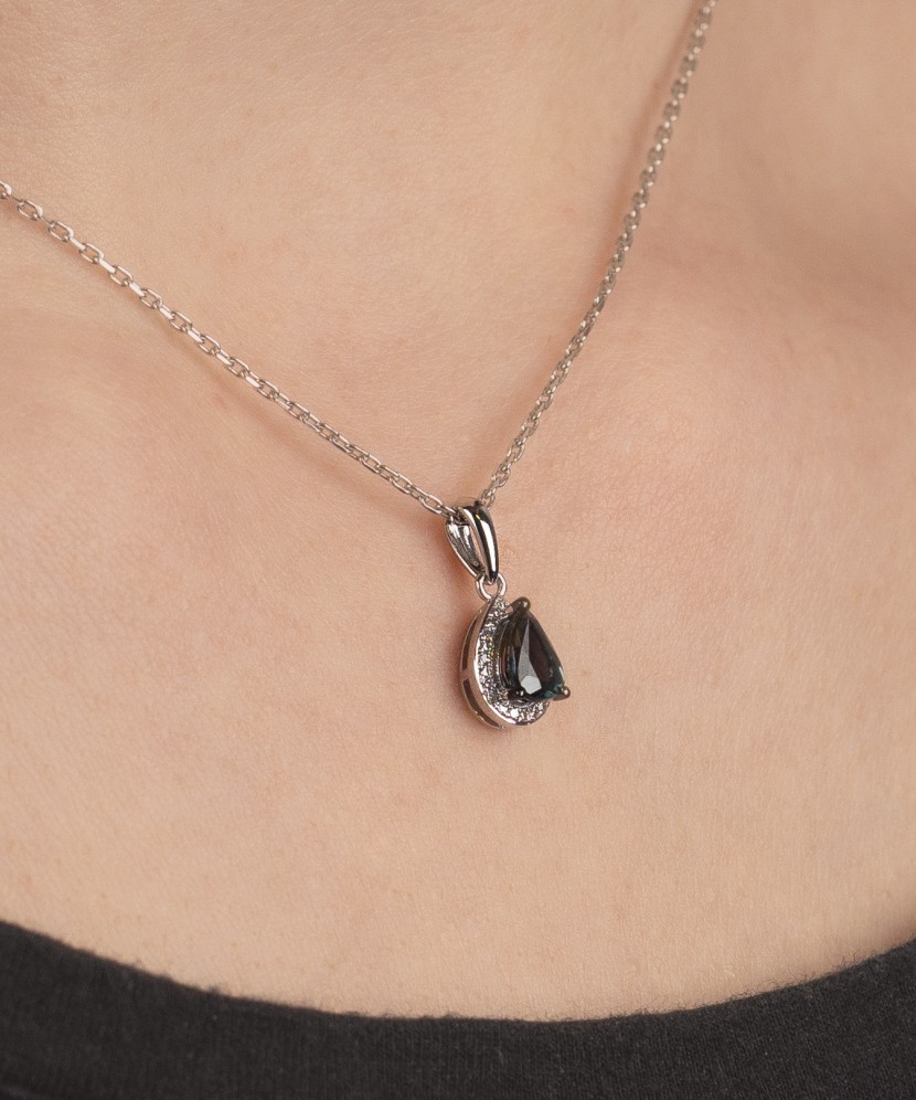 White gold pendant with diamonds and sapphires