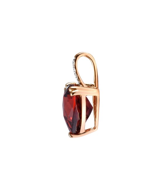 Gold pendant with diamonds and garnet