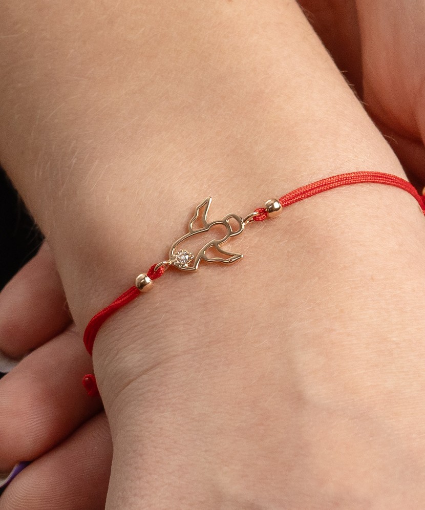 Red string bracelet with gold pendant "angel"