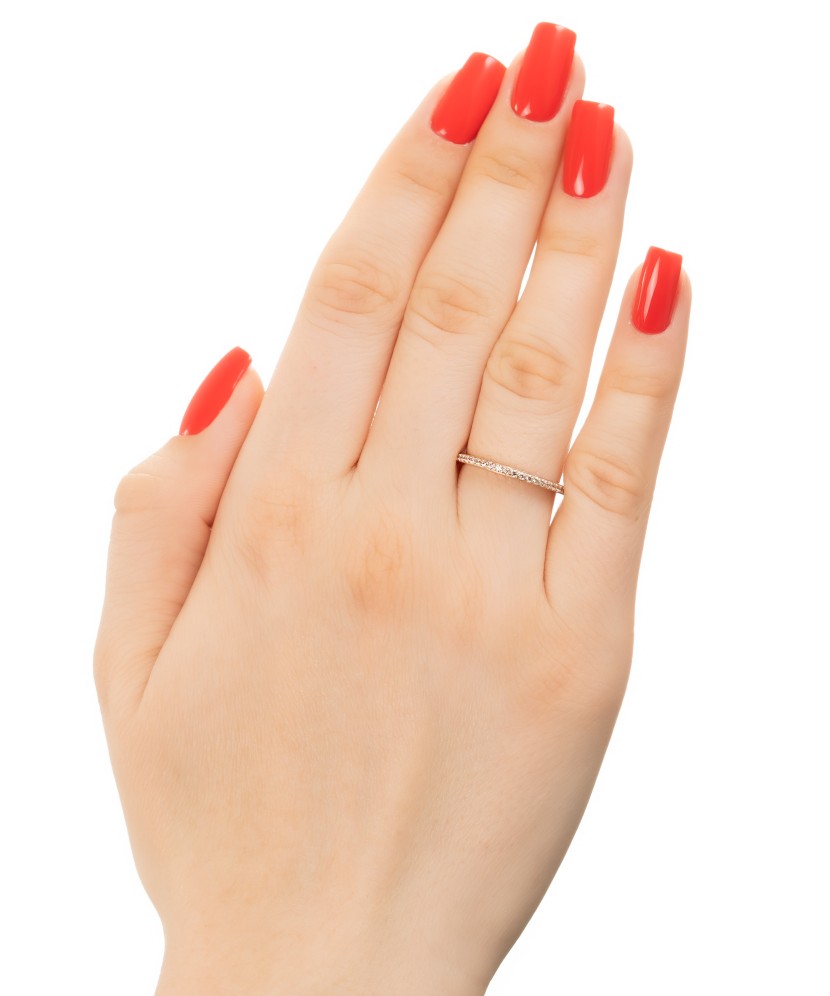 White gold ring with zircons