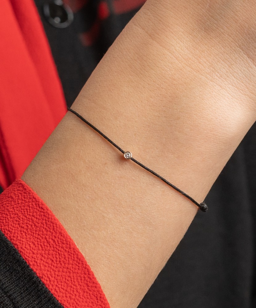 Black string bracelet white gold and diamond pendant 0.03ct