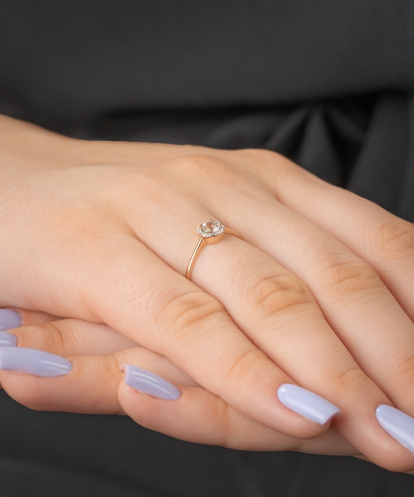 Gold ring with diamonds and clear topaz