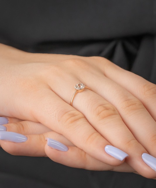 Gold ring with diamonds and clear topaz