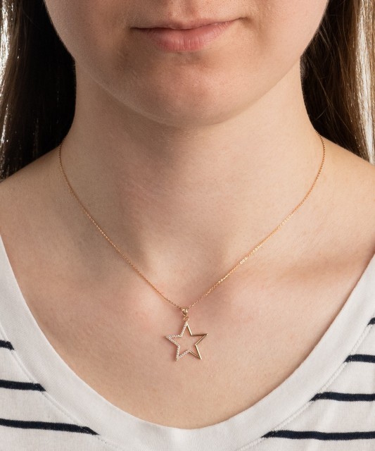 Gold pendant with zircons "star"