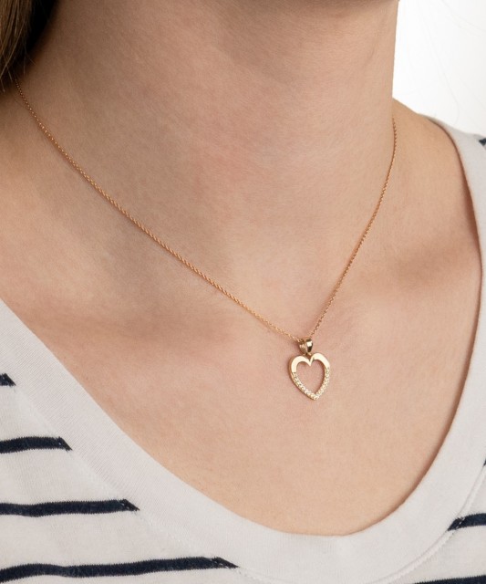 Gold pendant with zircons "heart"