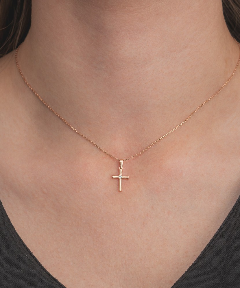 Gold pendant with zircons "cross"