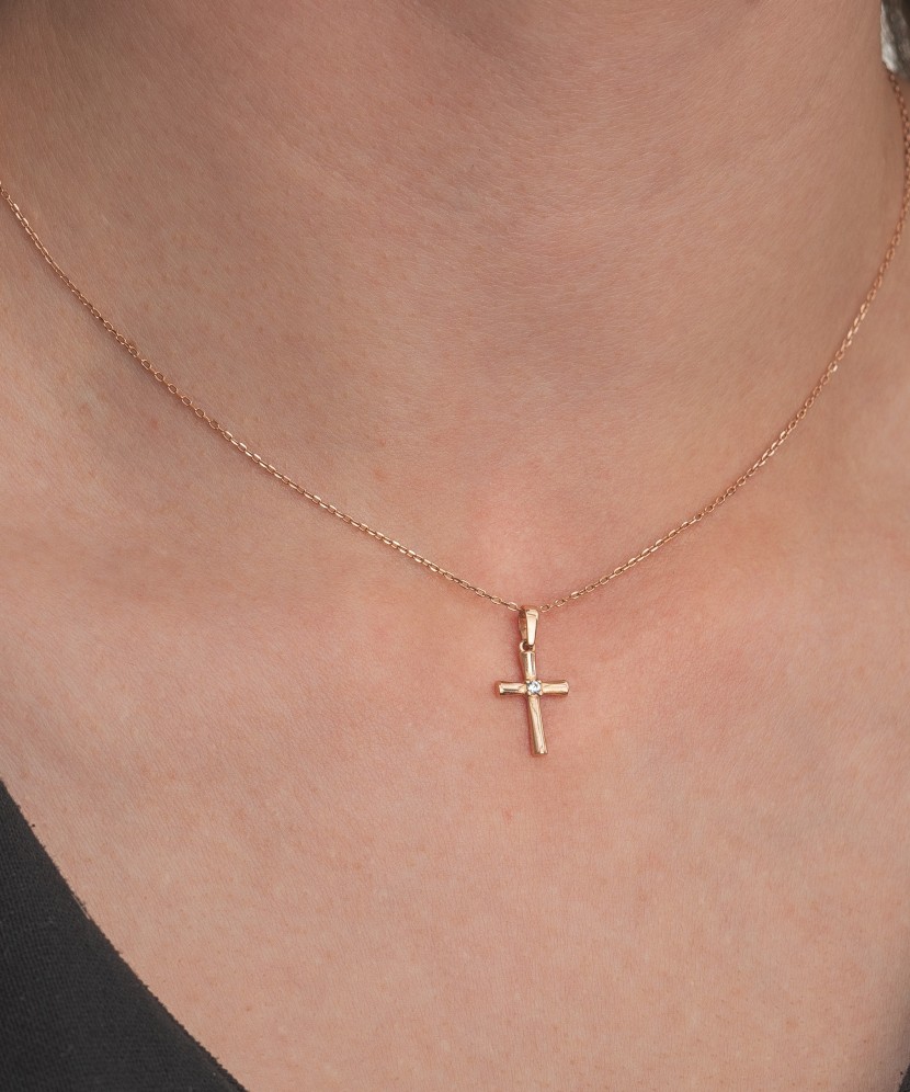 Gold pendant with zircons "cross"