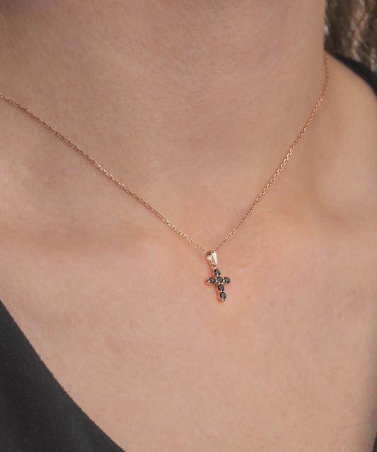 Gold pendant with zircons "cross"
