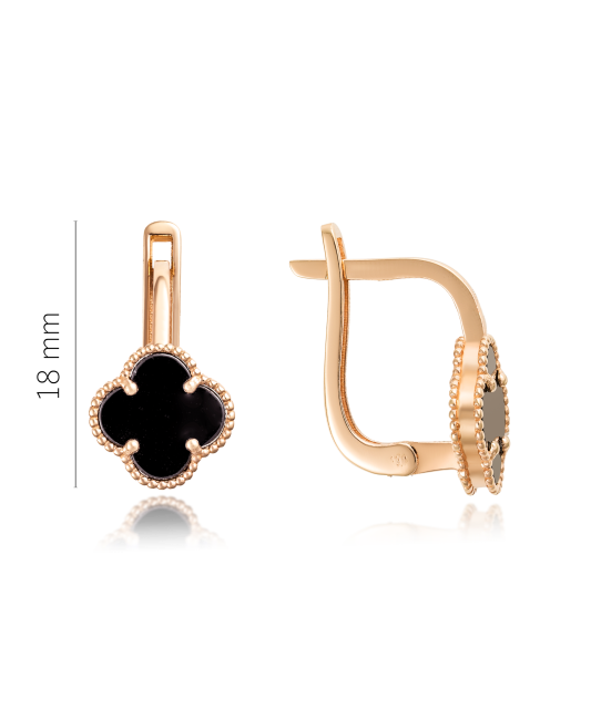 Gold brooch with onyx