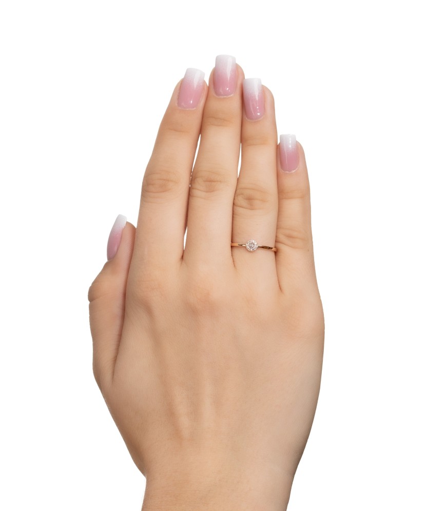 Gold ring with zircons