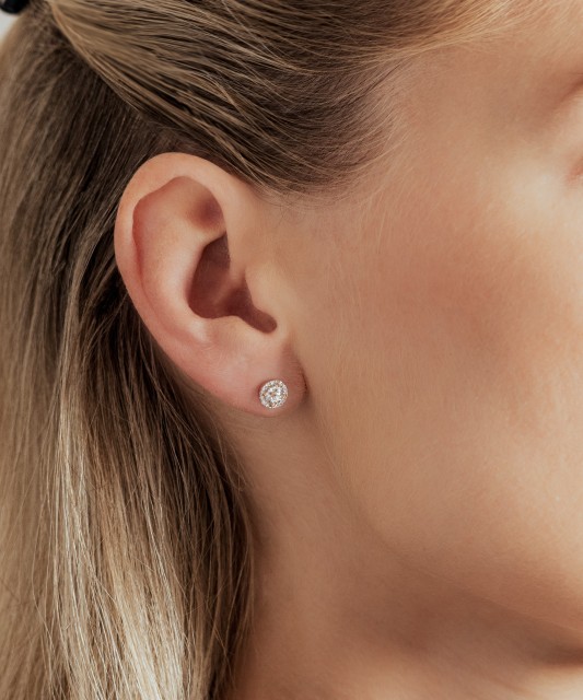 Gold earrings with diamonds and clear topaz