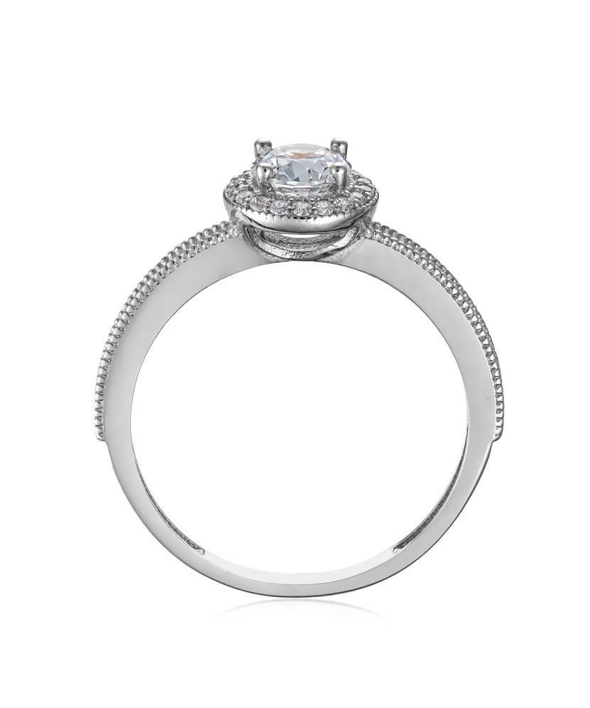 White gold ring with zircons