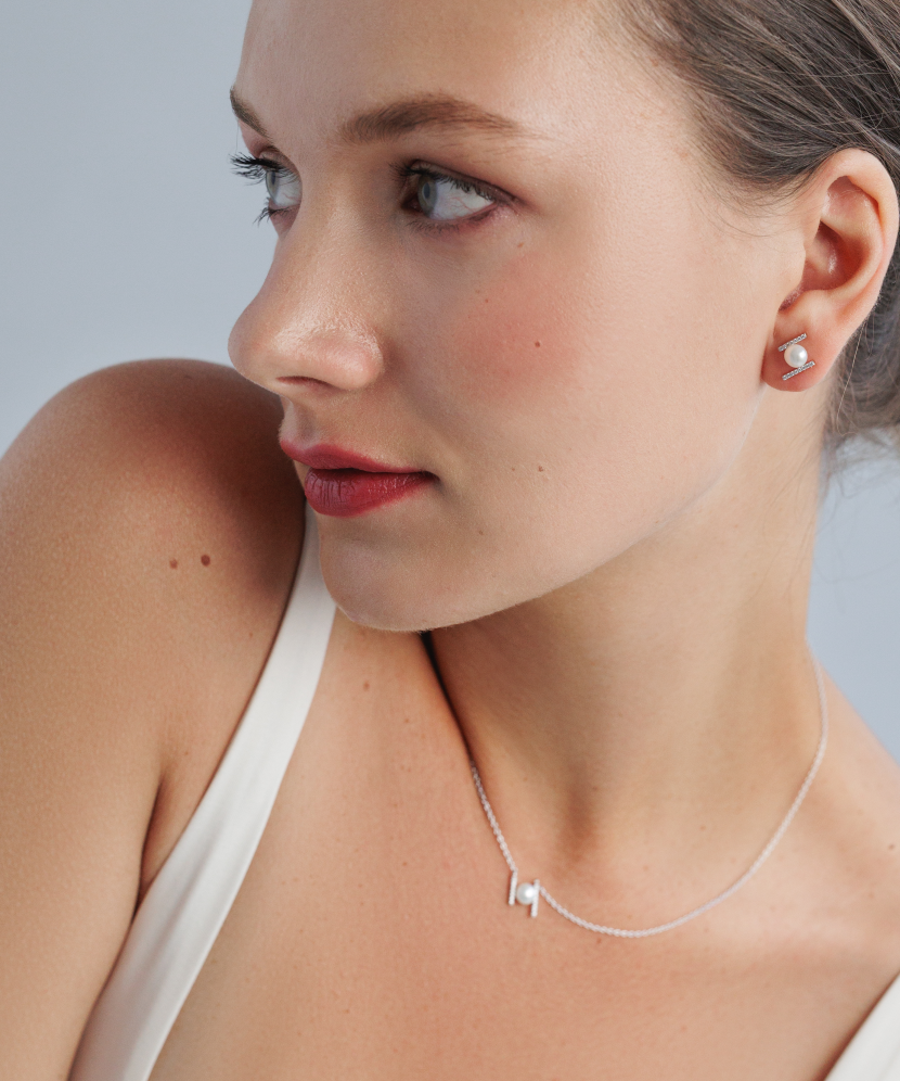 Sterling silver earrings with pearls and zircons Sterling silver earrings with pearls and zircons