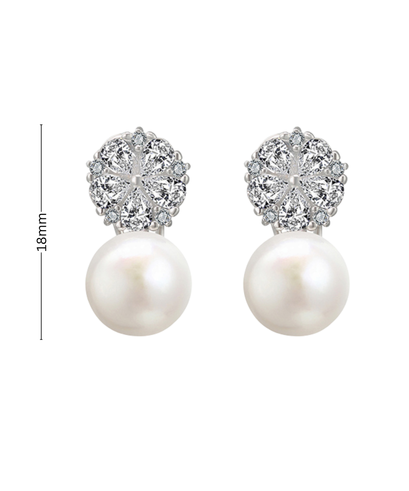 Серьги из серебра с жемчугом и цирконами Серьги из серебра с жемчугом и цирконами