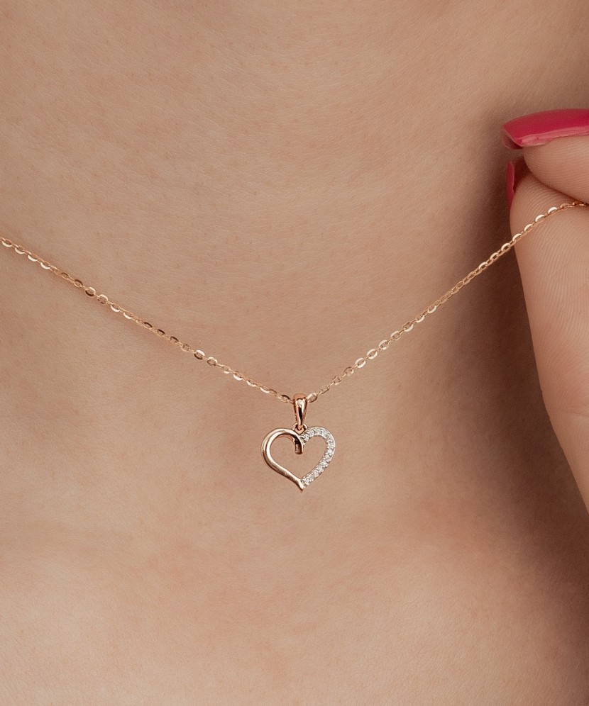 Gold pendant with diamonds "heart"