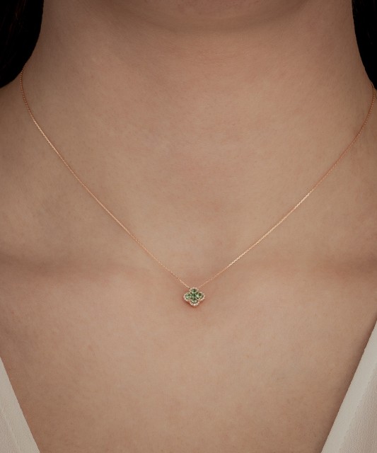 Gold chain with emerald and diamond pendant