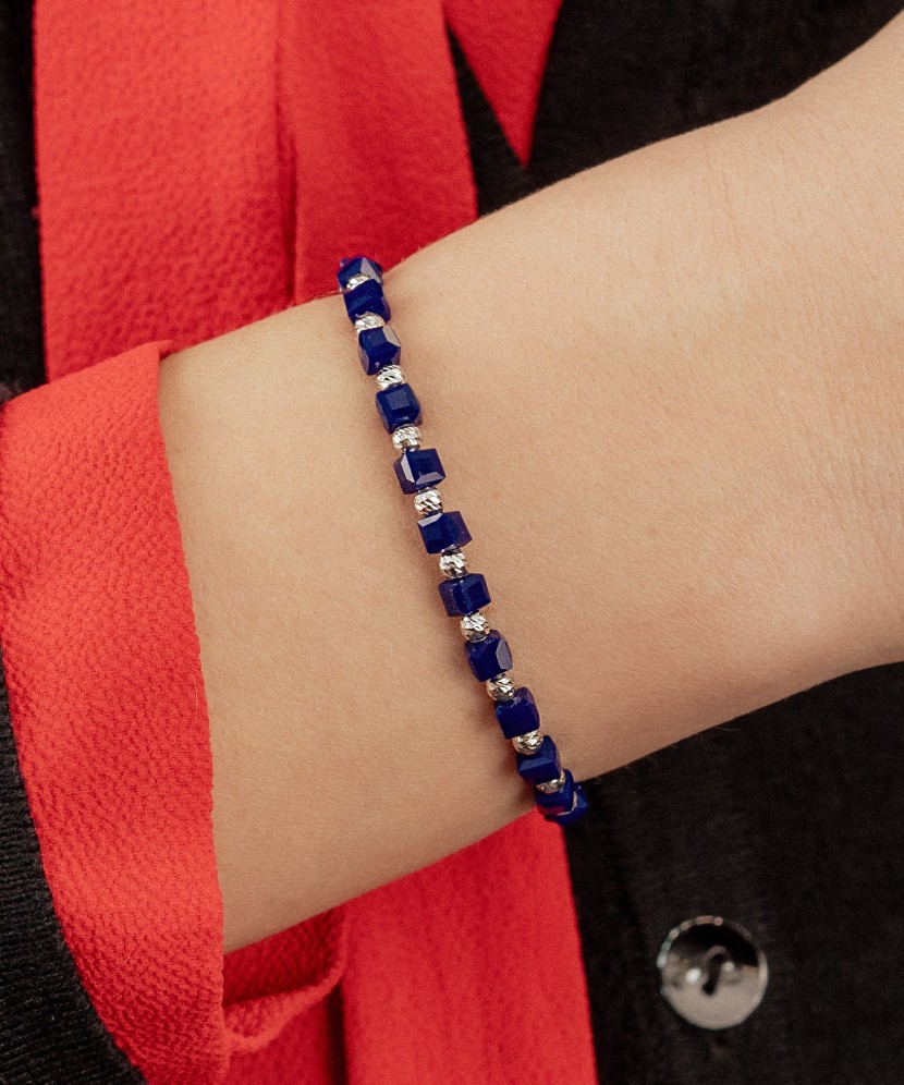 Black string bracelet with silver and onyxes