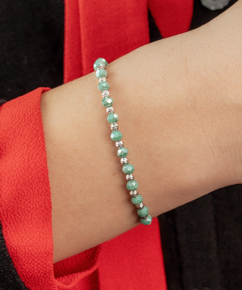 Black string bracelet with silver and onyxes