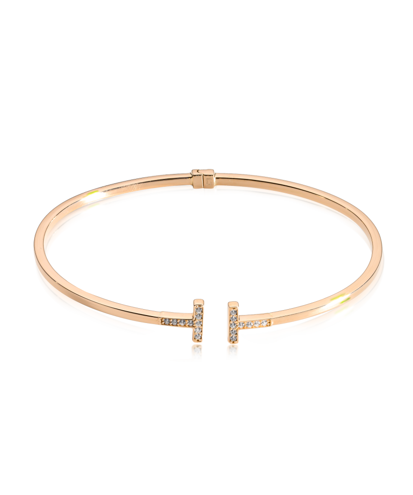 Gold hard bracelet with zircons