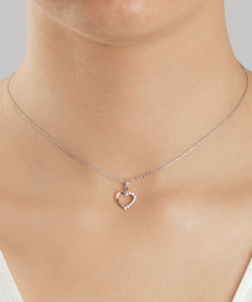 White gold pendant with zircons "heart"