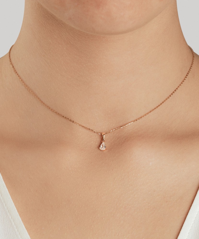 Gold pendant with zircons