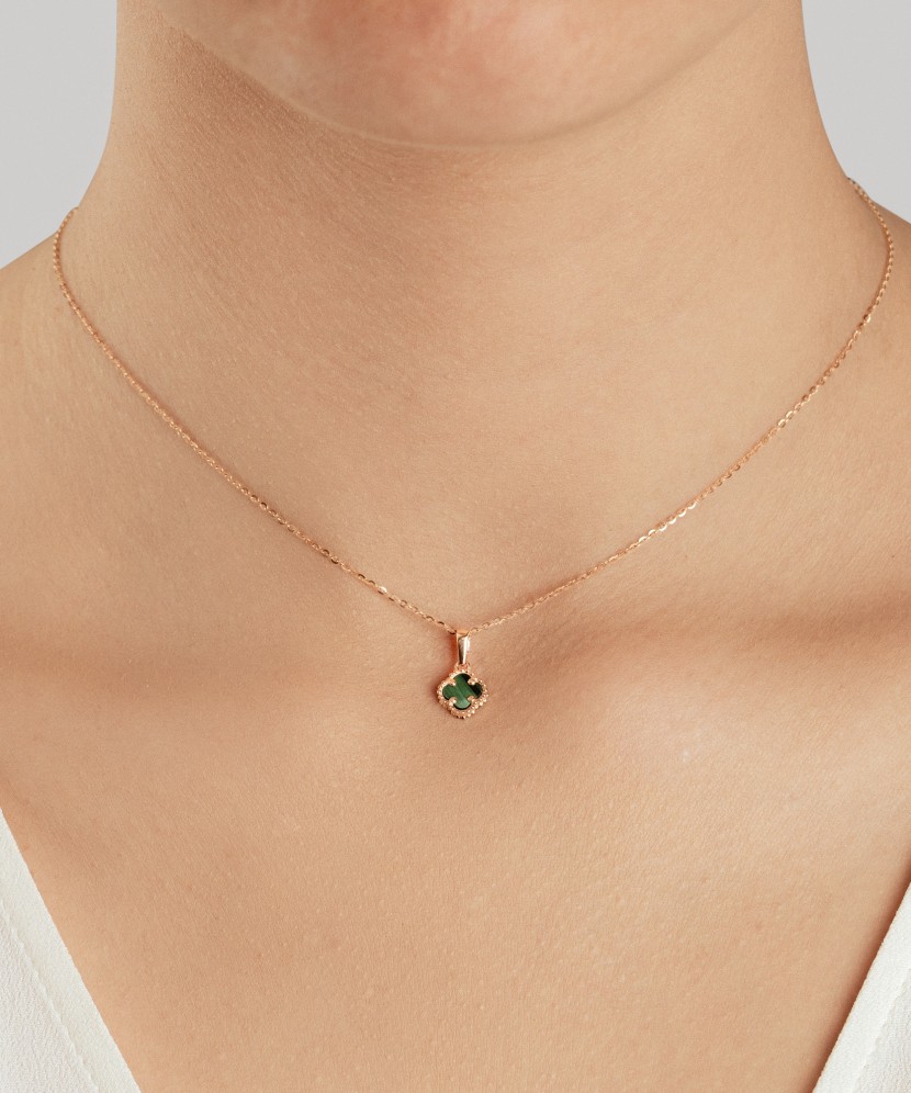 Golden pendant with malachite