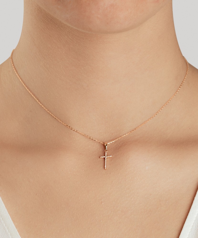 Gold pendant with zircons "cross"