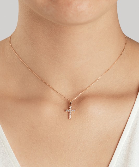 Gold pendant with zircons "cross"