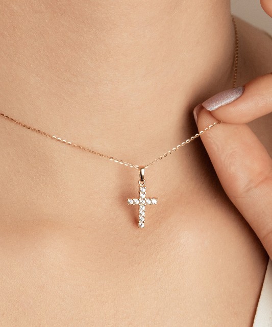 Gold pendant with zircons "cross"